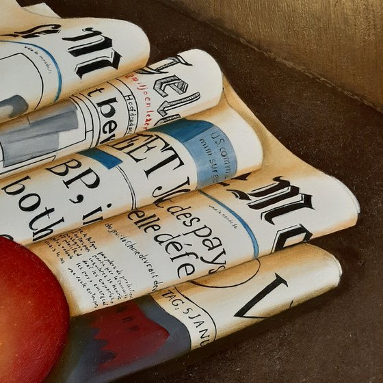 Newspaper with apples