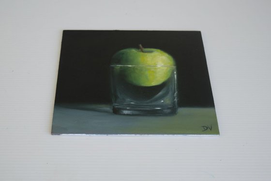 Glass half full #1 - Still life with apple and glass