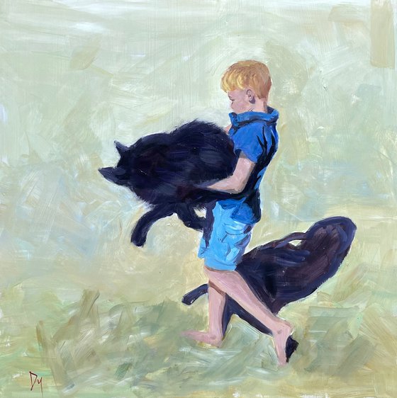 Boy with big black cat