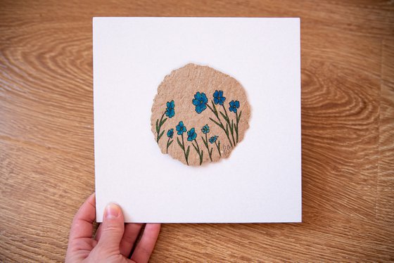 Blue flowers drawing on the author's craft paper