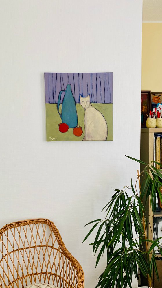 Still life and a white cat.