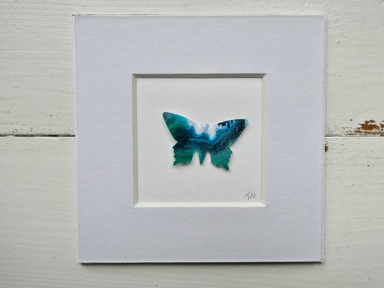 One Emerald Butterfly