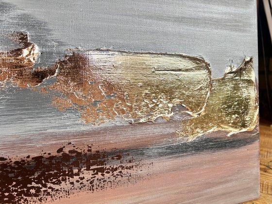 Textured gold and silver relief