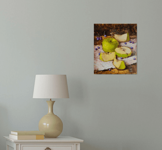 Green apples on dark