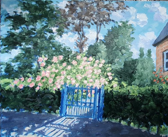 Pink flowers and blue gate