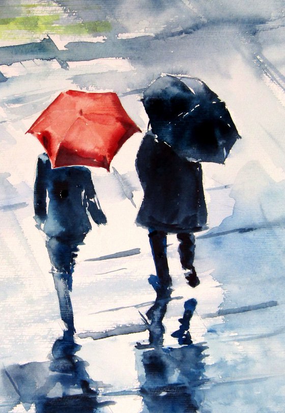 Family with umbrellas