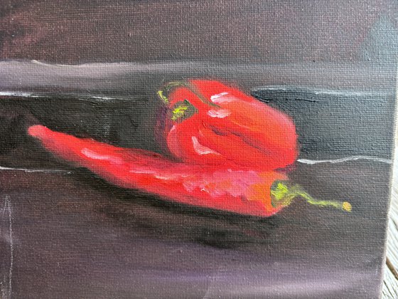 Still life with red peppers