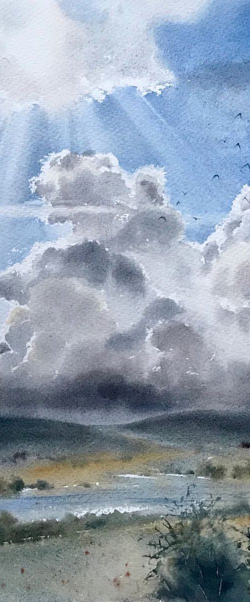 Field and clouds by Eugenia Gorbacheva