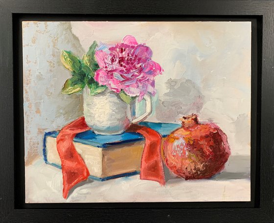 Teacups, Peony flower, Books and pomegranate.