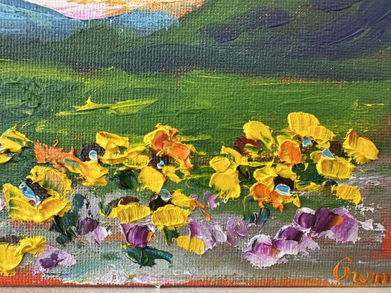 Orange sunset with flowers