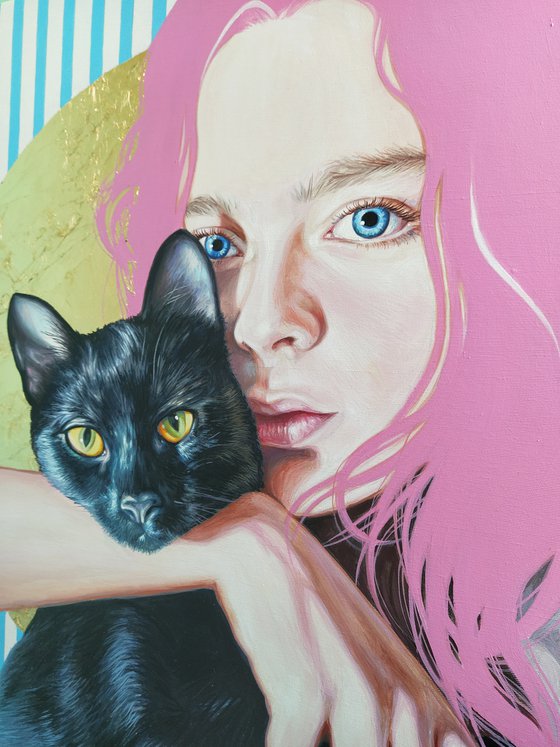 Portrait of a girl with a black cat