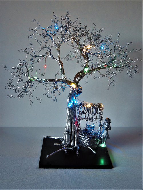 Tree with Lady, wishing well and lights by Steph Morgan