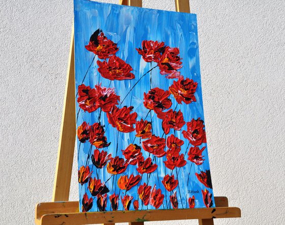 Poppies On Blue