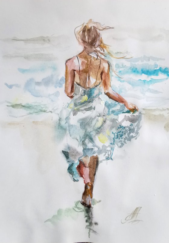 Girl running to the sea