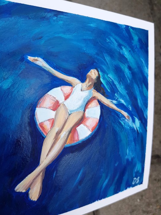 Woman with the swim ring