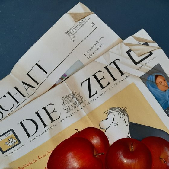 Newspaper with apples