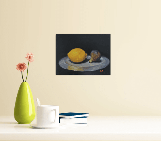 A Lemon, a fig & a Pewter Plate.