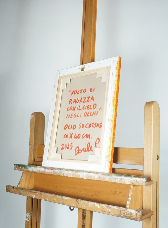 Young woman with the sky in her eyes