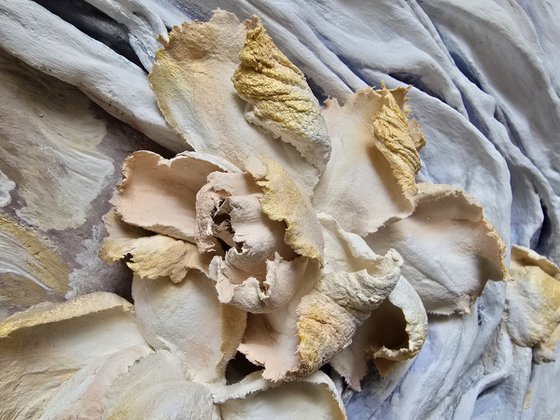 Floral and folds relief panel