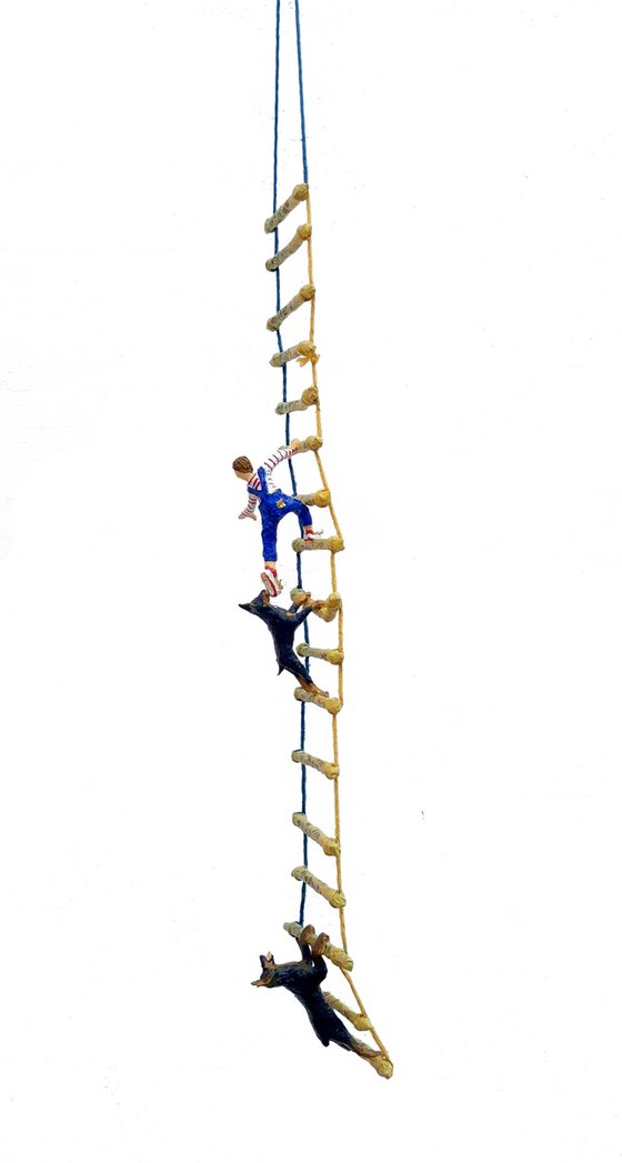 Two Dobermans on ladder