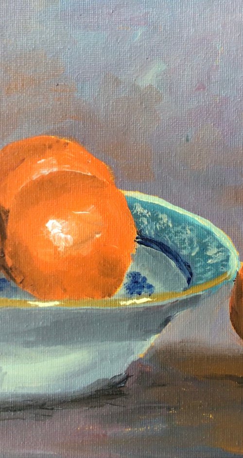 Oranges in a blue bowl. An original still life painting by Julian Lovegrove Art