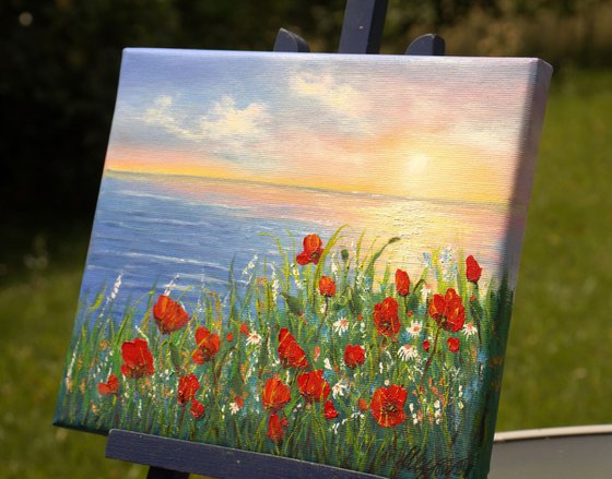 Sunset seascape and poppies