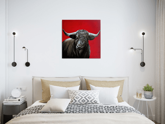 Brave bull on red
