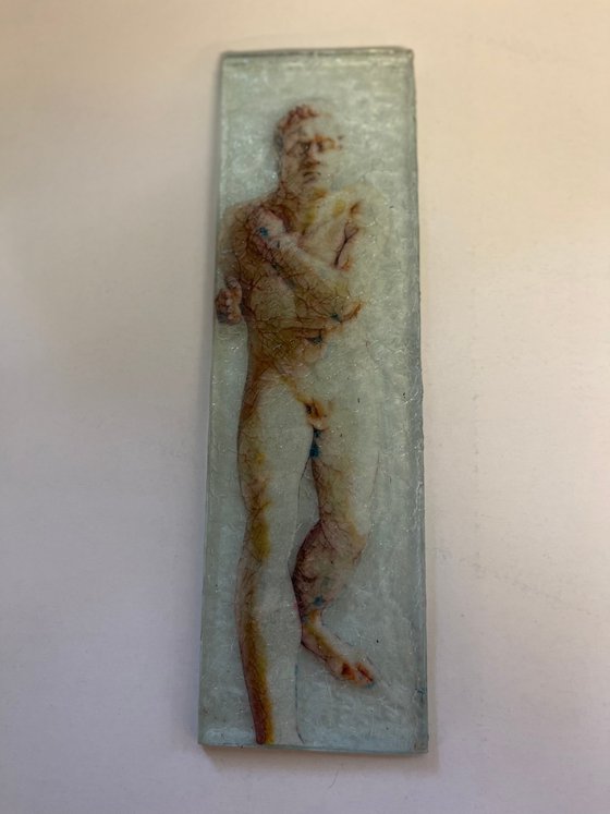 Man, walking : Silk on glass art