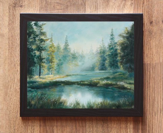 Misty lake in a pine forest