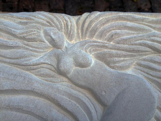 When Nyx draws her cloudy cloak; low relief carving in limestone