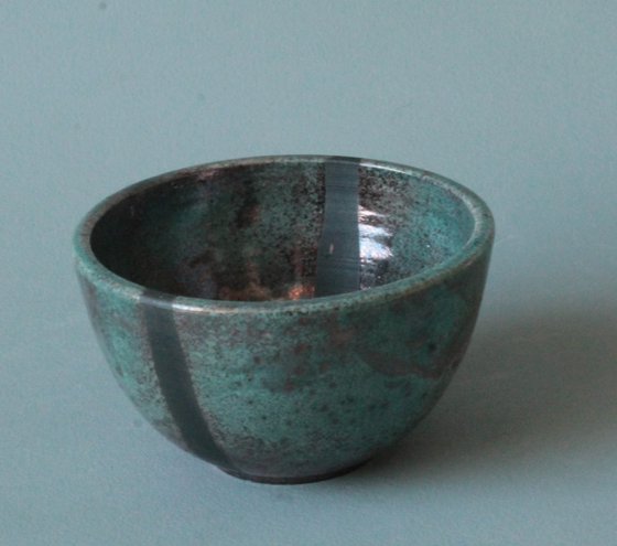 Raku Bowl with a smoked black stripe 3.