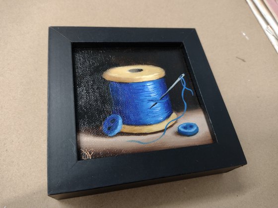 Little Blue cotton reel  still life