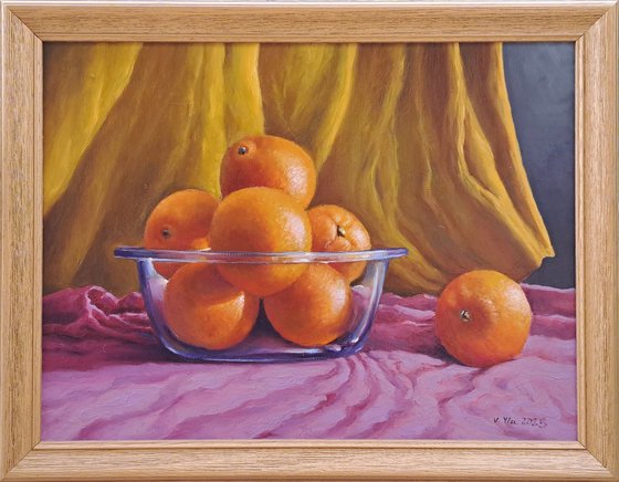 Oranges in a glass bowl
