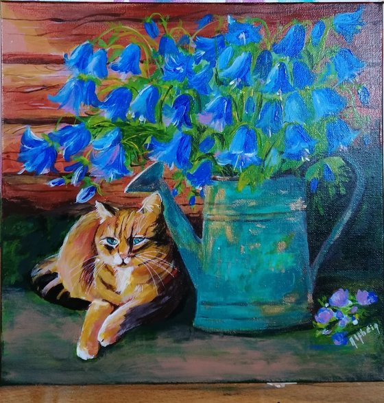 Blue flowers and cat