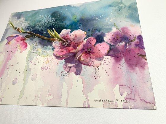 Peach tree branch with flower