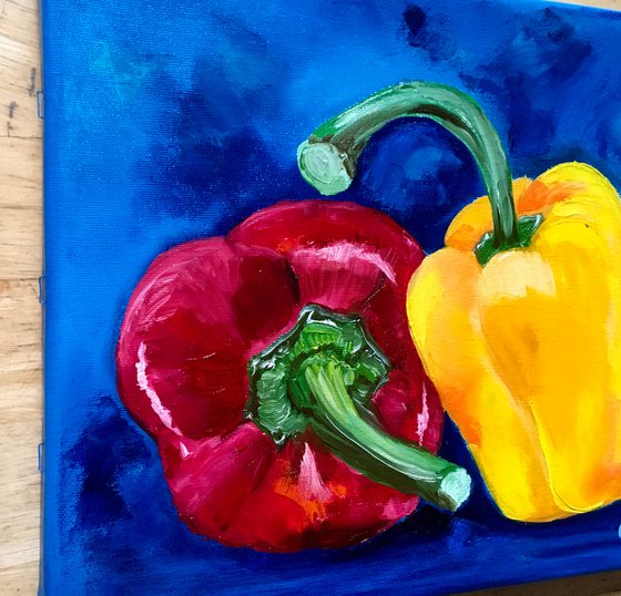 ReD and yellow Peppers on navy  blue background  #7