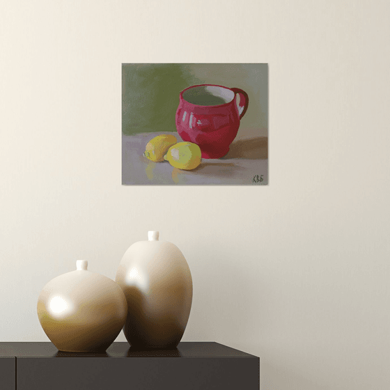 Red Cup and Two Lemons