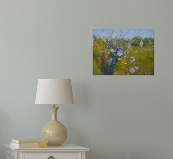 Flowers against a landscape