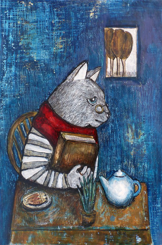 Cat reading a book