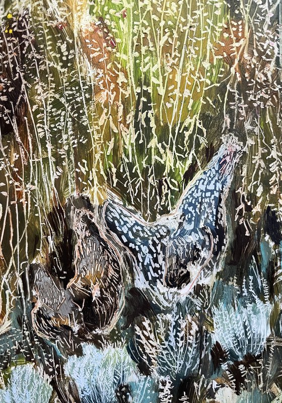 Two chickens in the garden