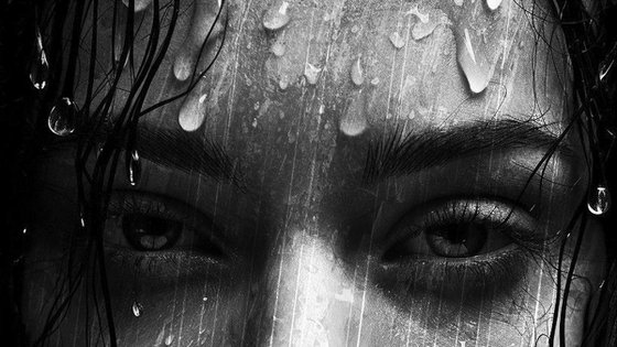 Girl with Flower in the Rain