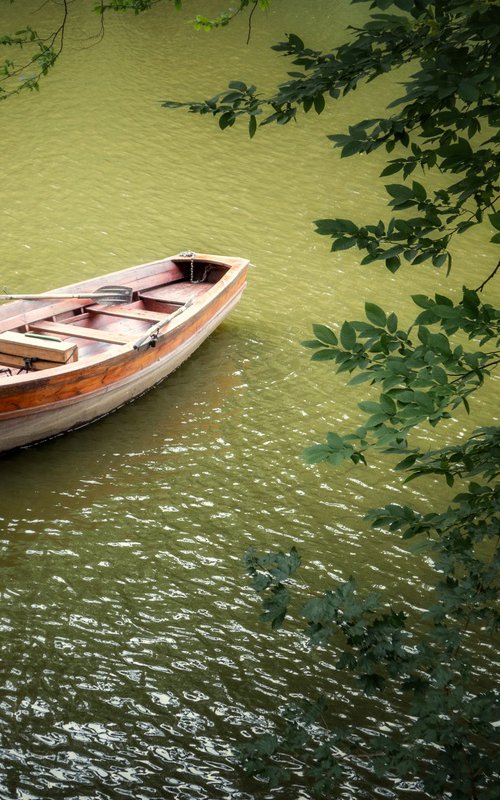 Boat on the river by Vlad Durniev