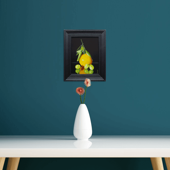 Orange with three grapes