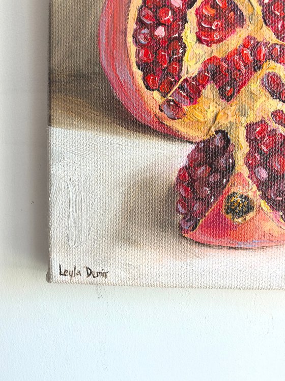 Pomegranate on white