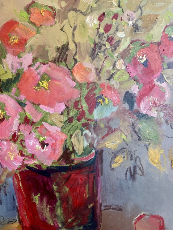 Flowers in a red vase