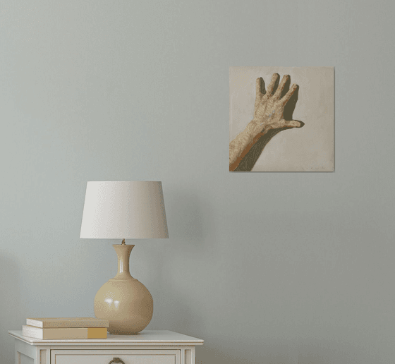 modern impressionist hand on a white wall