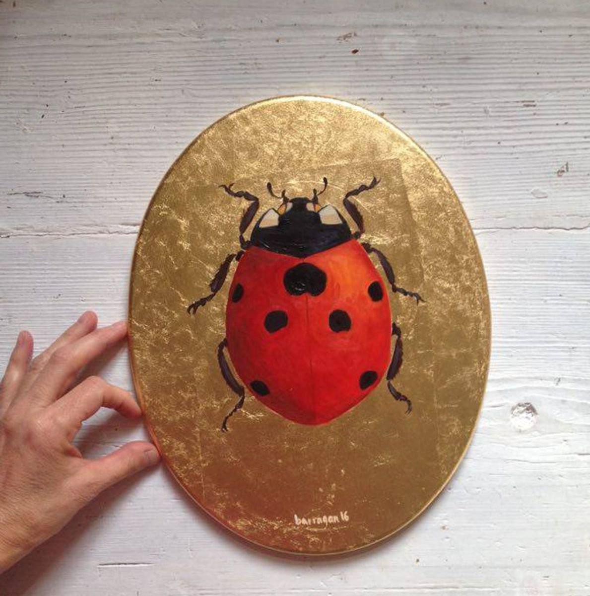 My Big Golden Ladybug Oil Painting on Oval Lacquered Golden Leaf Canvas Frame by Caridad I. Barragan