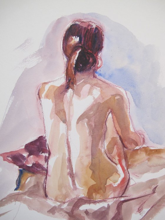 Seated female nude back view