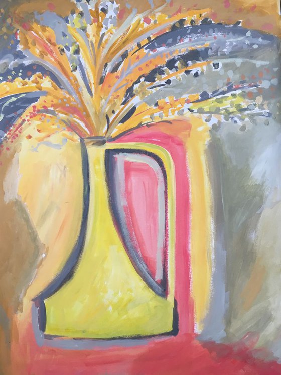 Yellow jug with grasses