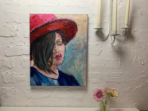 Woman in a red hat.